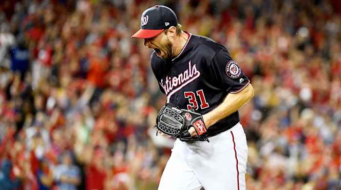 Oct 7, 2019; Washington, DC, USA; Washington Nationals starting pitcher Max Scherzer (31) reacts after the last out of the top of the seventh inning against the Los Angeles Dodgers in game four of the 2019 NLDS playoff baseball series at Nationals Park. Mandatory Credit: Brad Mills-USA TODAY Sports